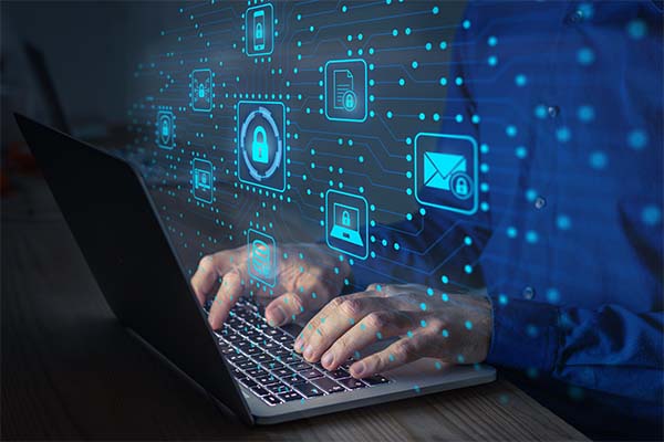 Person typing on a computer