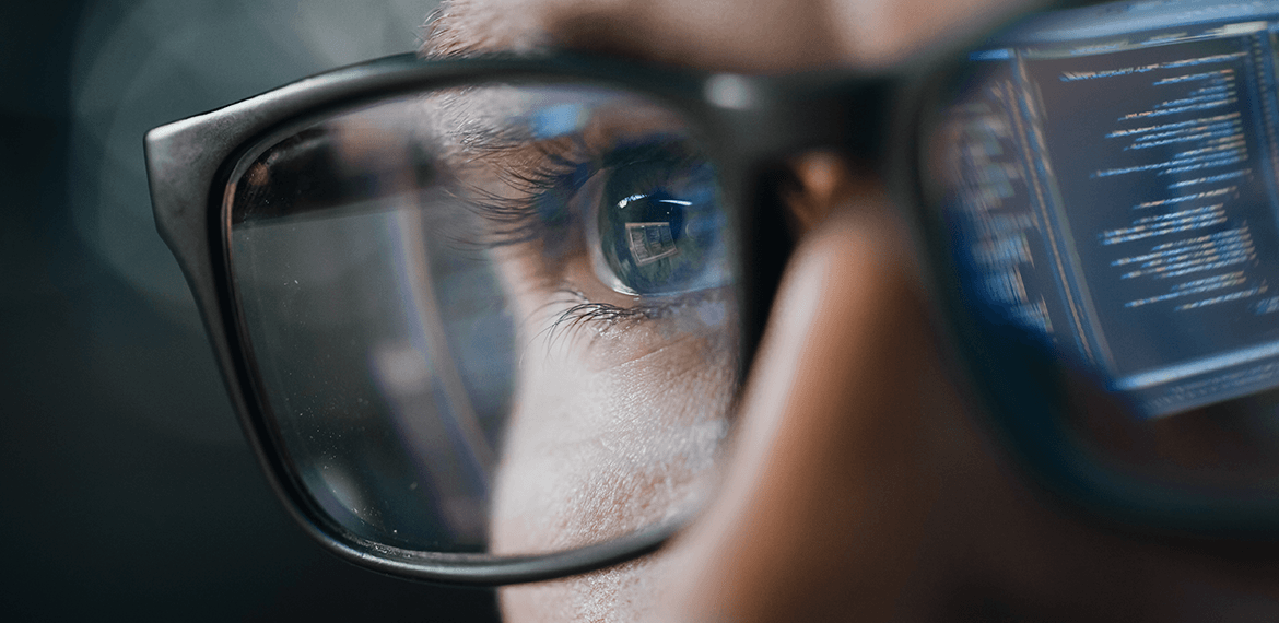 IT worker looking at a computer