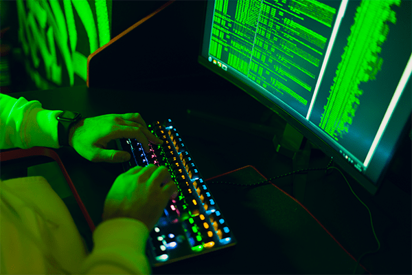 Person typing on keyboard