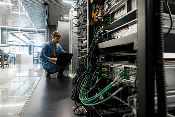 Man working in server room