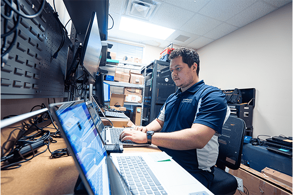 Person fixing a computer