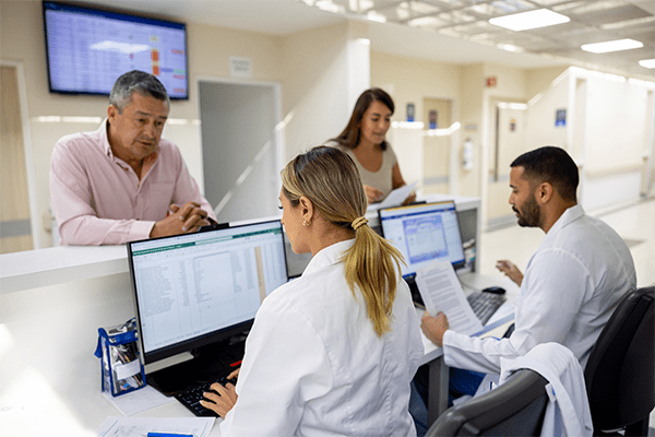 Nurses helping patients