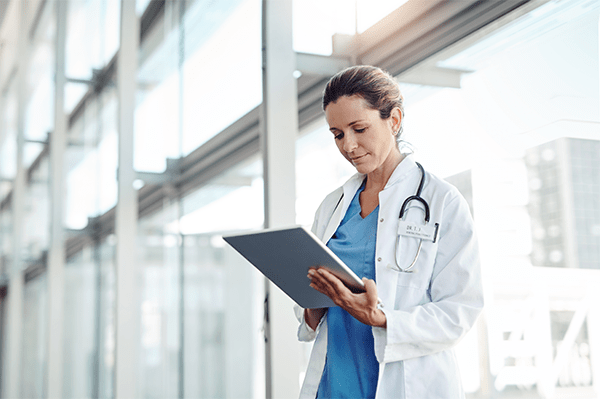 Nurse checking patient records
