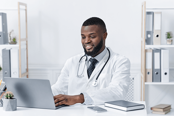 Doctor on computer