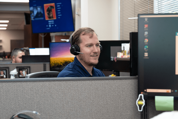 MITS team member helping a client on a call
