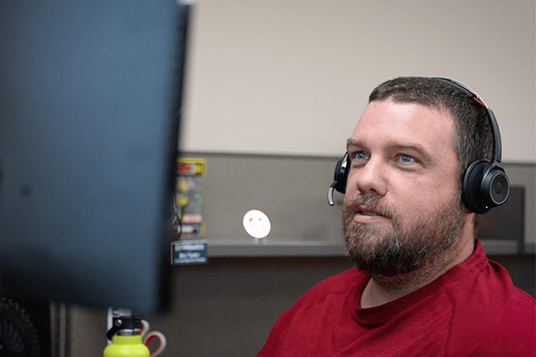 MITS help desk support member on a call
